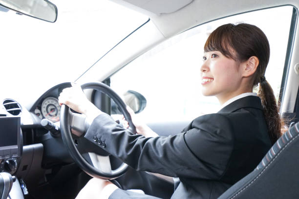 istock Businesswoman driving a car 899586792