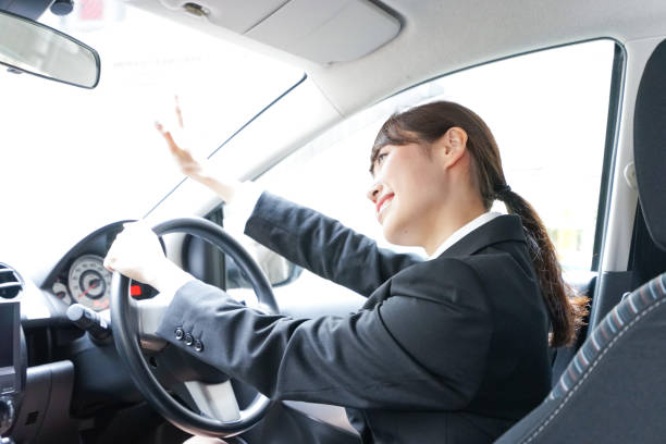 istock Businesswoman driving a car 899586794