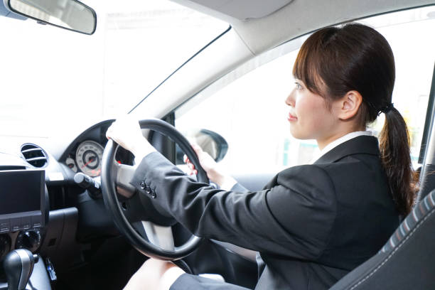 istock Businesswoman driving a car 899586812