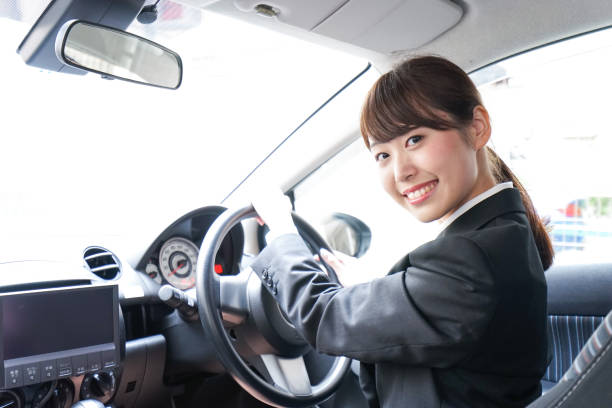 istock Businesswoman driving a car 899586818