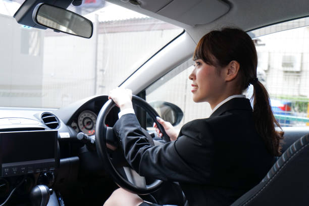 istock Businesswoman driving a car 899586824