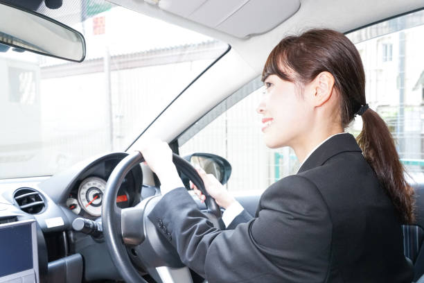 istock Businesswoman driving a car 899586834