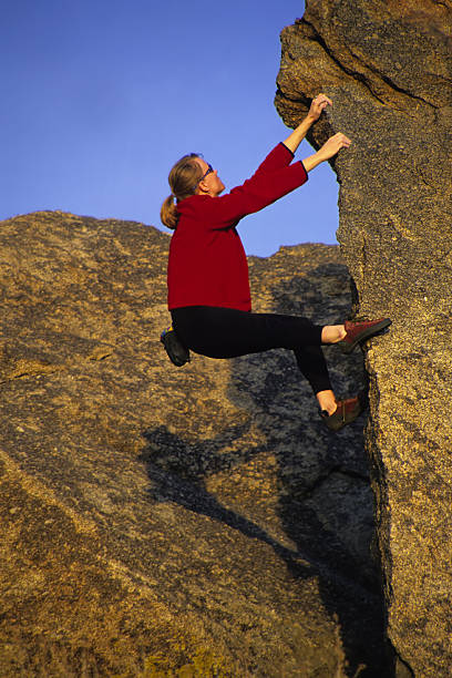 istock rock climbing woman 89959662