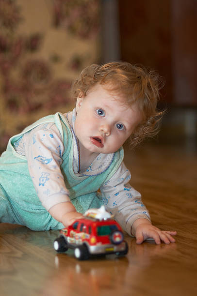 istock Baby and car toy 89959831