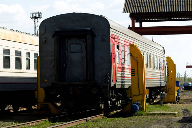 istock Passenger car on the railway tracks 899605888