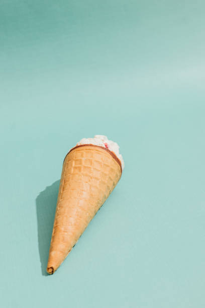 istock Vertical image of ice cream cone 899607500