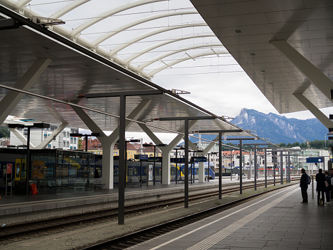 SALZBURG, AUSTRIA - SEPTEMBER 11, 2017: Train passengers travel to Salzburg Hauptbahnhof, is the main railway station in Salzburg, capital of the federal state of Salzburg, Austria