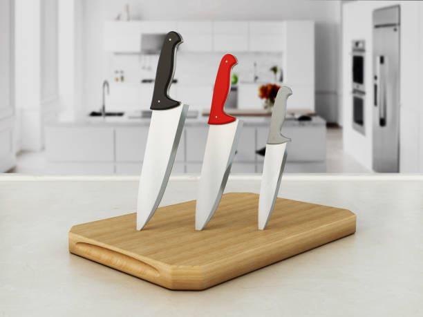 istock Set of kitchen knives on cutting wood standing on kitchen counter 899614210