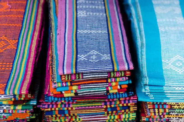 Photo of traditional woven tais fabric scarves in dili souvenir market east timor leste