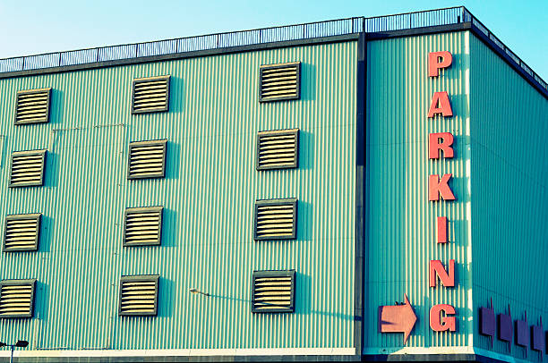istock multi-storey concrete sixties car park, retro cross processed 89961836