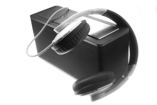 istock Headphones and amplifier on white background 899618966
