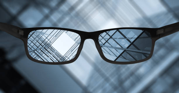 clear vision, steel and glass finance building seen through glasses - spirituality eyesight space abstract imagens e fotografias de stock