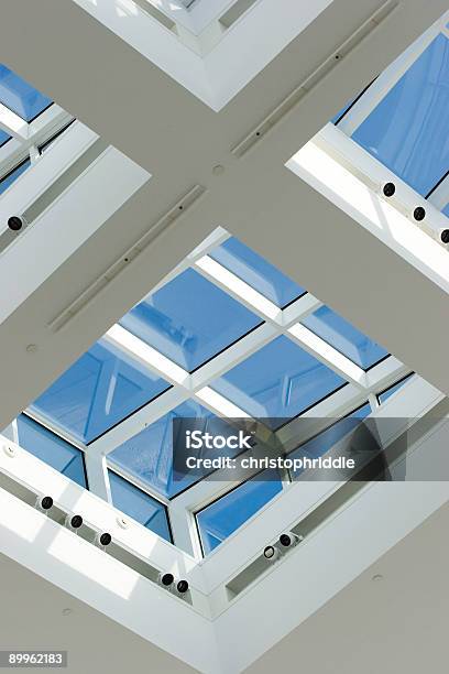 An Image Of A Roof With Skylight Windows Stock Photo - Download Image Now - Architecture, Blue, Bright