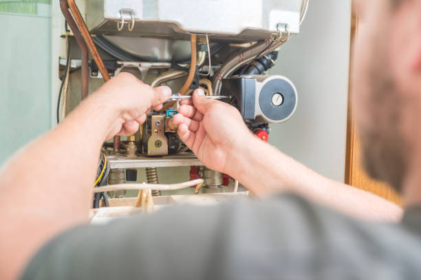 istock Technician repairing Gas Furnace 899623492