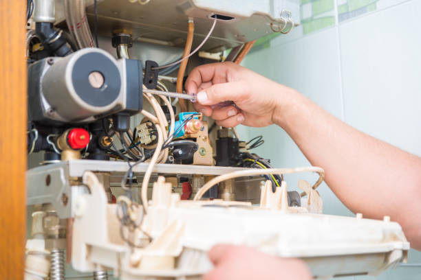 istock Technician repairing Gas Furnace 899623494