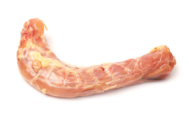 istock Raw chicken neck, chicken macro separated on white background macro 899624682