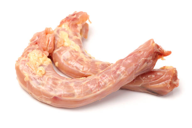 istock Raw chicken neck, chicken macro separated on white background macro 899624718