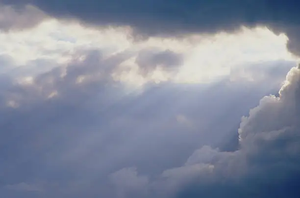 Photo of Clouds breaking w/ Beams