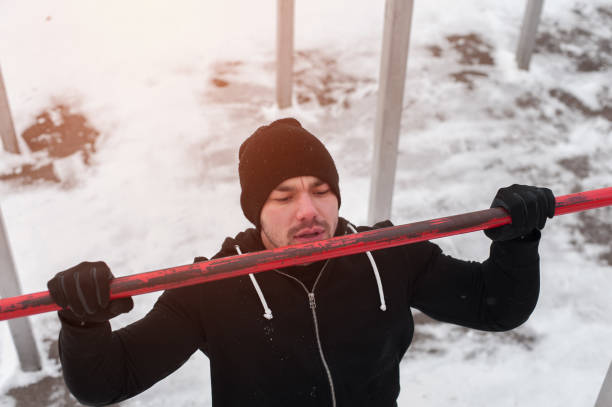 istock Fitness man working out in winter 899625202