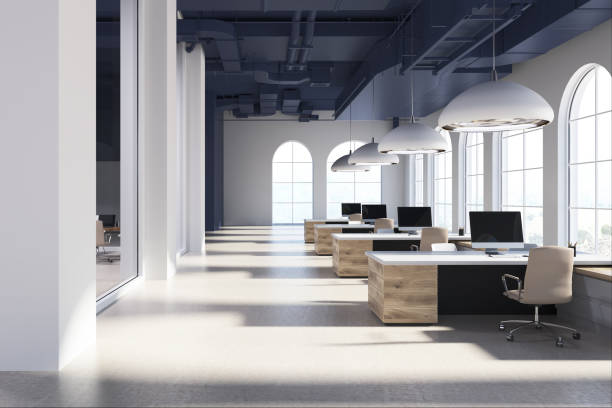 istock White office, wooden tables 899628090