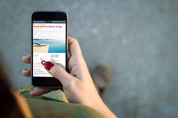 istock Woman walking smartphone luxury hotels interface 899629604