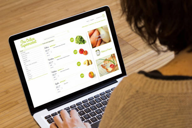 istock woman computer online supermarket 899629644