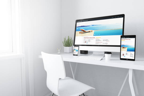 istock devices on white minimal workspace resort and spa website 899629808
