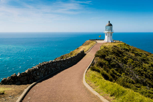 Cape Reinga Lighthouse and a sunny blue sky day, New Zealand stock photo