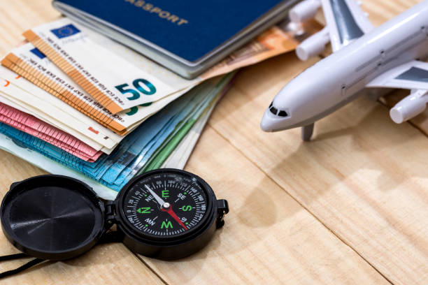 istock Preparing for a trip concept, an airplane money passport 899632012