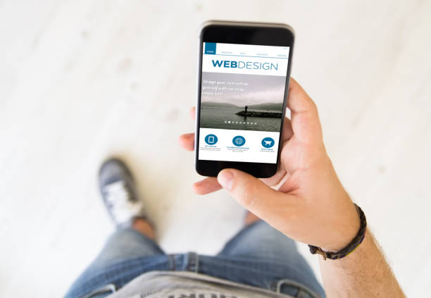istock male hand web design smart phone 899640042