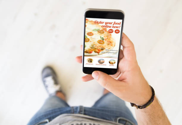 istock male hand order food online 899640074