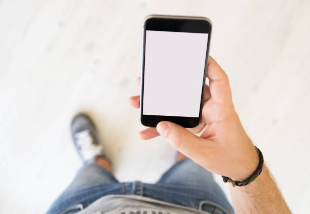 istock male hand white screen smart phone 899640142