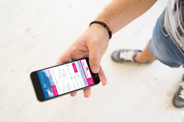 istock male hands air tickets app smartphone 899640164