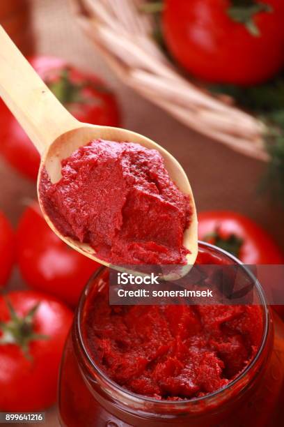 Tomato Paste Stock Photo - Download Image Now - Tomato Paste, Spoon, Art