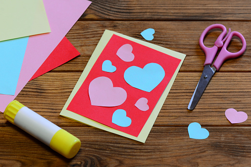 Easy Valentines day paper card crafts for children. Top view. Valentines day paper crafts. Valentines day homemade crafts. Valentines day crafts for boyfriend. Paper greeting card. Holiday and seasonal card. Happy Valentine day