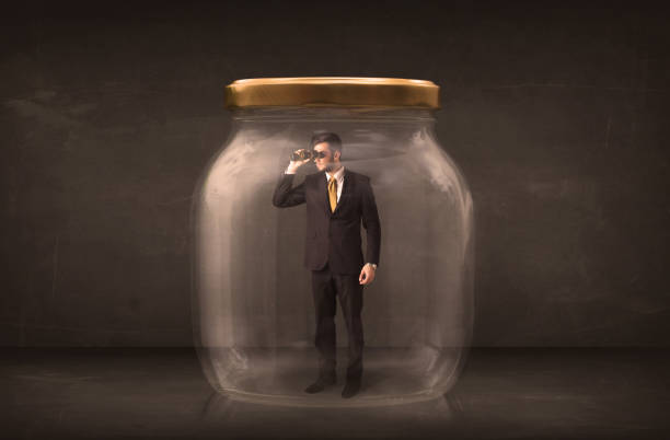 istock Businessman shut into a glass jar concept 899665712