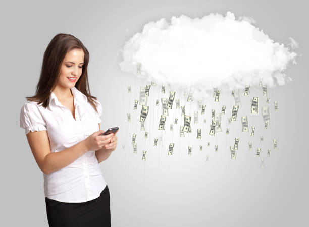 istock Woman with cloud and money rain concept 899665944