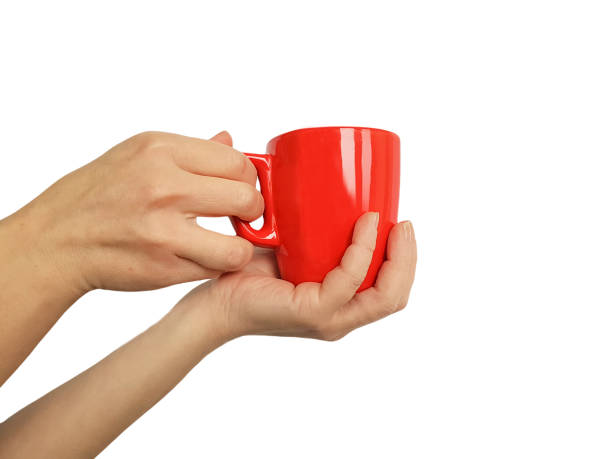 istock female hand with a red cup isolated 899669892