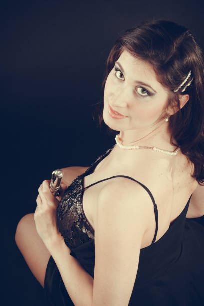 istock Elegant woman with flute instrument. 899670724