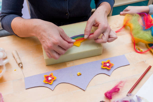 istock Hands Making Beautiful Princess Crown from Felt 899673860