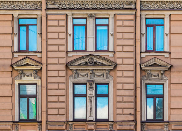 istock Windows in row on facade of historic building 899679370