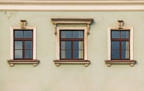 istock Windows in row on facade of historic building 899679702