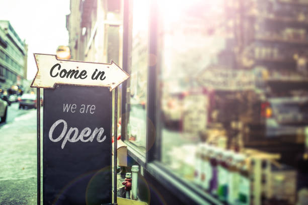 Come in, we're open sign on a glass door 'Come in, we are open' open sign stock pictures, royalty-free photos & images
