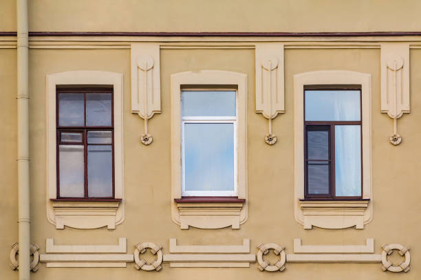 istock Windows in row on facade of historic building 899680258