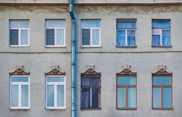 istock Windows in row on facade of historic building 899680318
