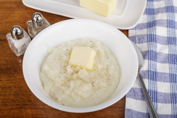 istock Bowl of Grits with Butter and Pepper 899691184
