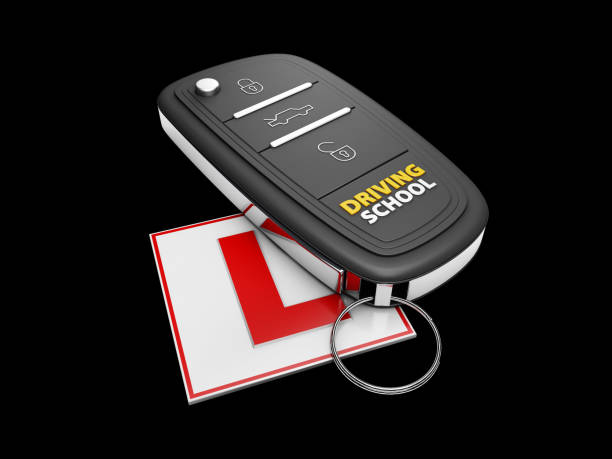 istock Car key on the white learner driver sign, isolated black, 3d Illustration 899692728