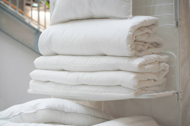 istock white duvet pile in decoration store 899699342