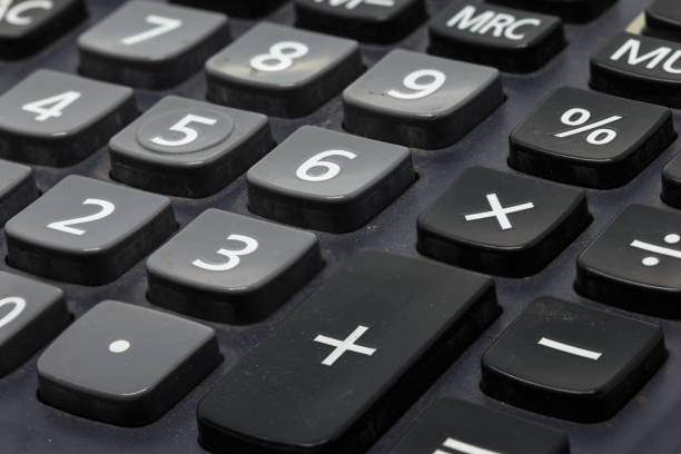 istock Calculator closeup detail background 899701938
