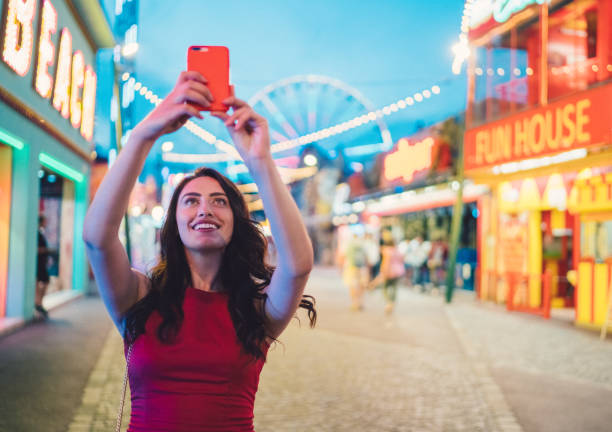 istock Tourist enjoying the funfair 899705046
